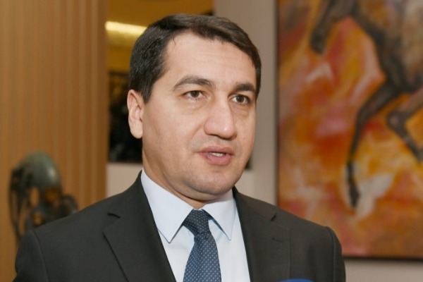 Hikmət Hacıyev: Ermənistanın Azərbaycanın işğal olunmuş ərazilərində apardığı qeyri-qanuni məskunlaşma müharibə cinayətidir